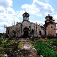 May 18, 2015: Remains of an Eastern Orthodox church after shelling by the Ukrainian Army near Donetsk International Airport. Eastern Ukraine. (Mstyslav Chernov. CC BY-SA 4.0, Wikimedia Commons)